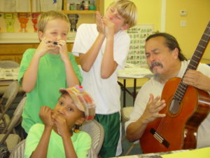 Martin Espino and Campers Playing Music